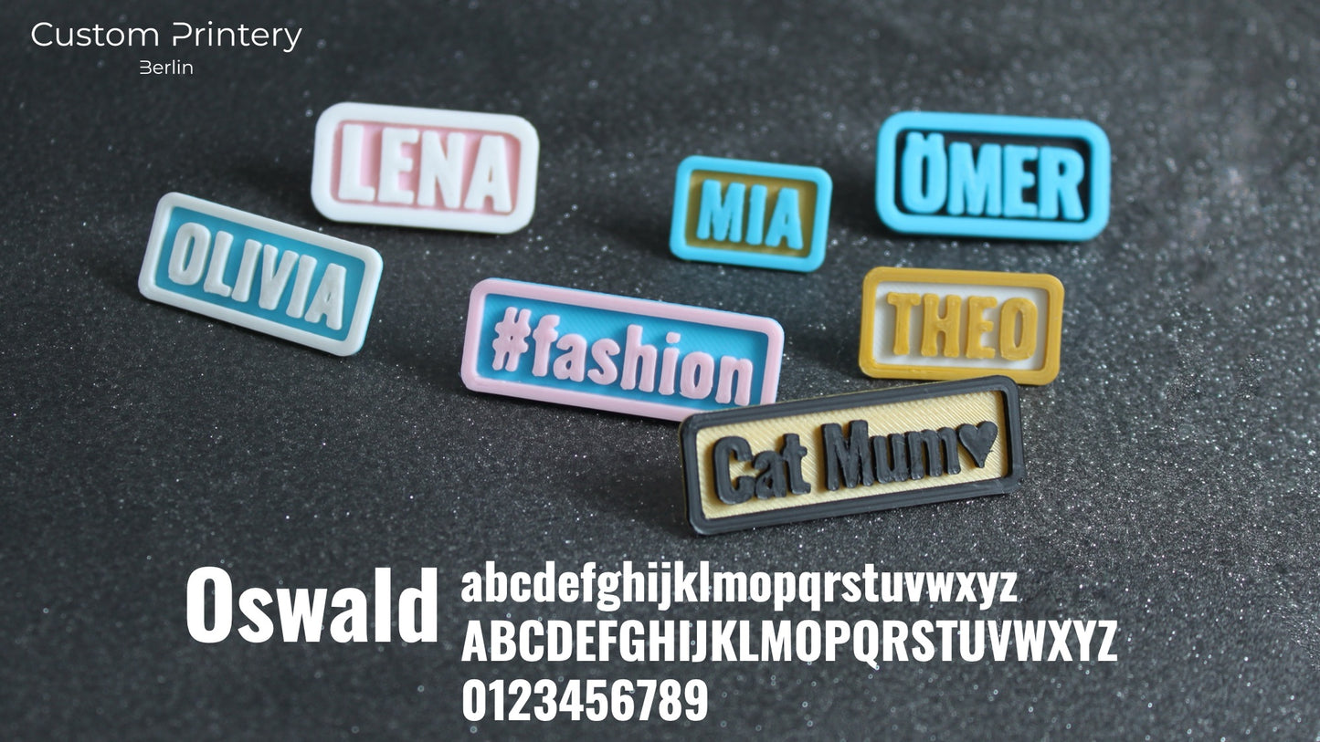 Custom galaxy-patterned Crocs with personalized name charms 'AZRA' and '#fashion' from Custom Printery Berlin, worn with white socks in an indoor setting